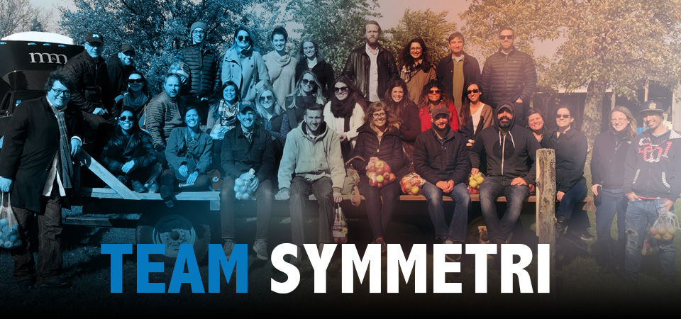 The Symmetri Marketing Group Team apple outing